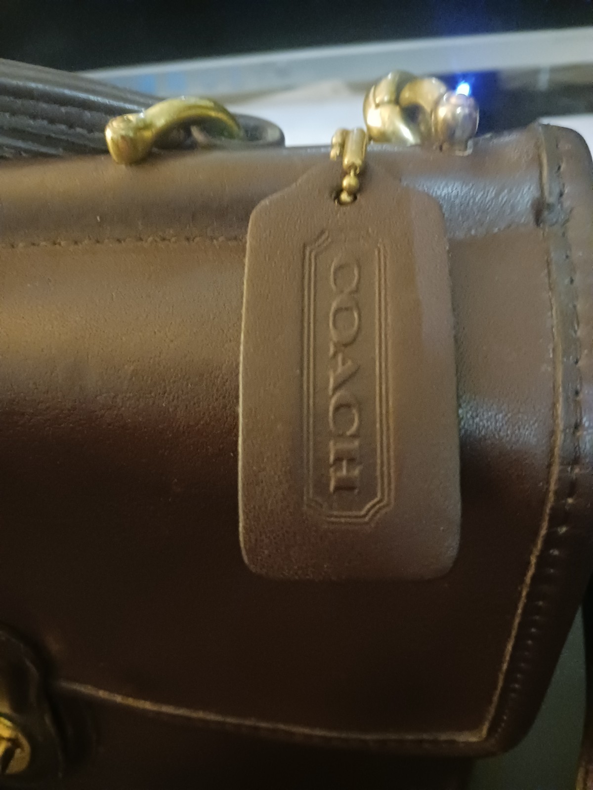 No. E80-9927 identifies your bag as a Coach Willis Bag, Style 9927 made in 1990.