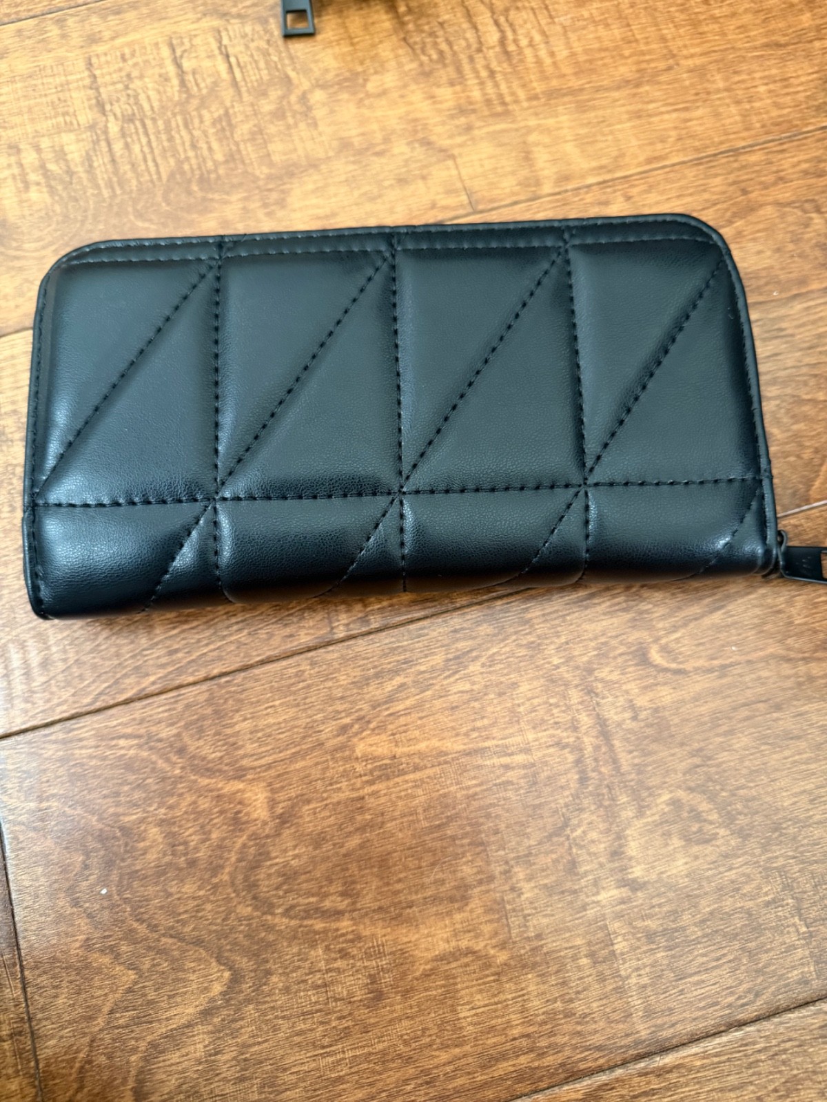 yves saint laurent black on black zip around quilted wallet
