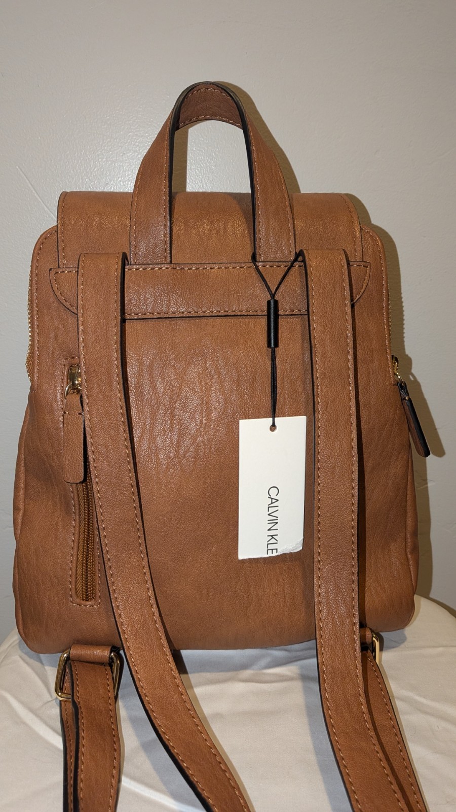 Calvin Klein Reyna Novelty Key Item Flap Backpack Caramel Color