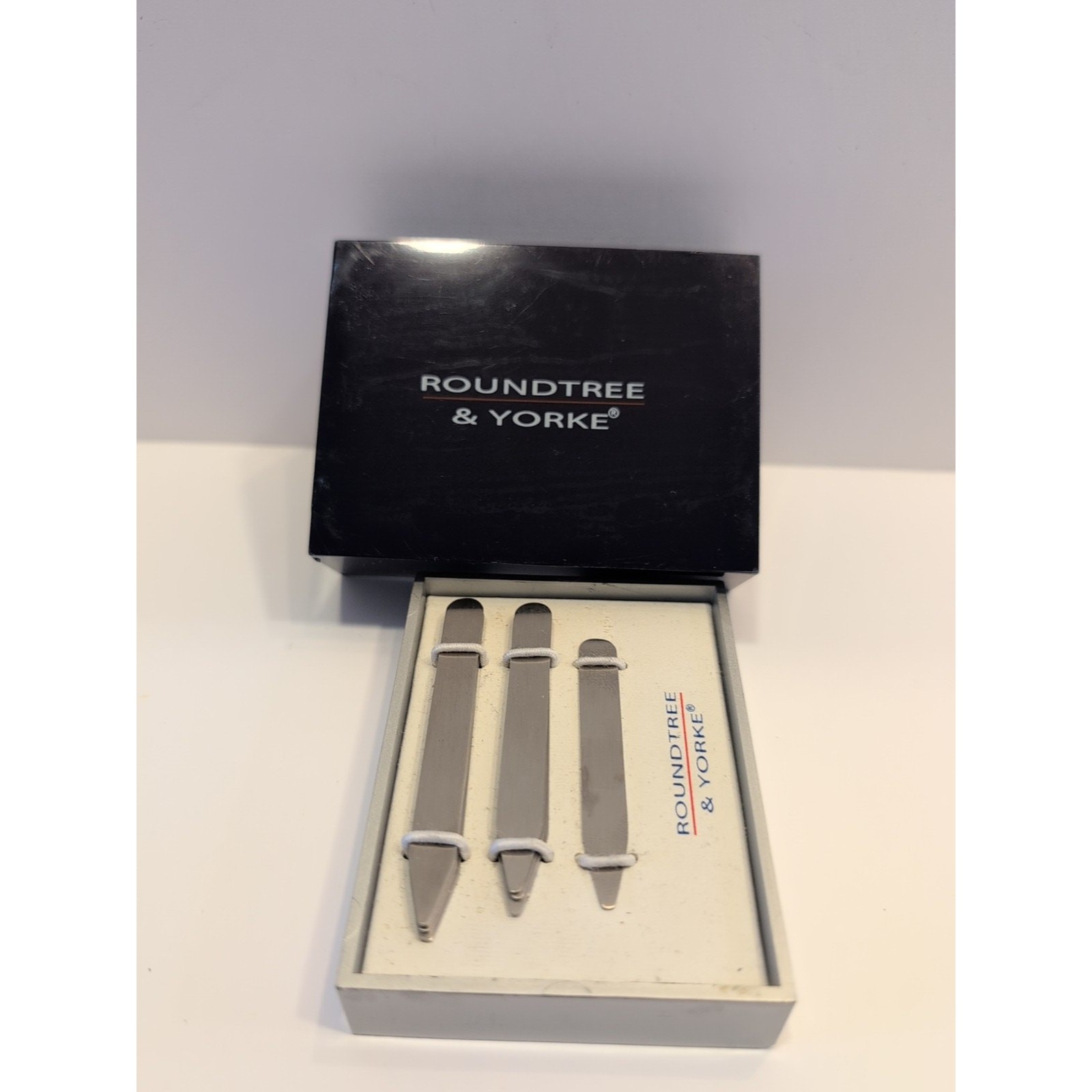 This is a set of 10 Assorted Roundtree & Yorke stainless steel collar stays