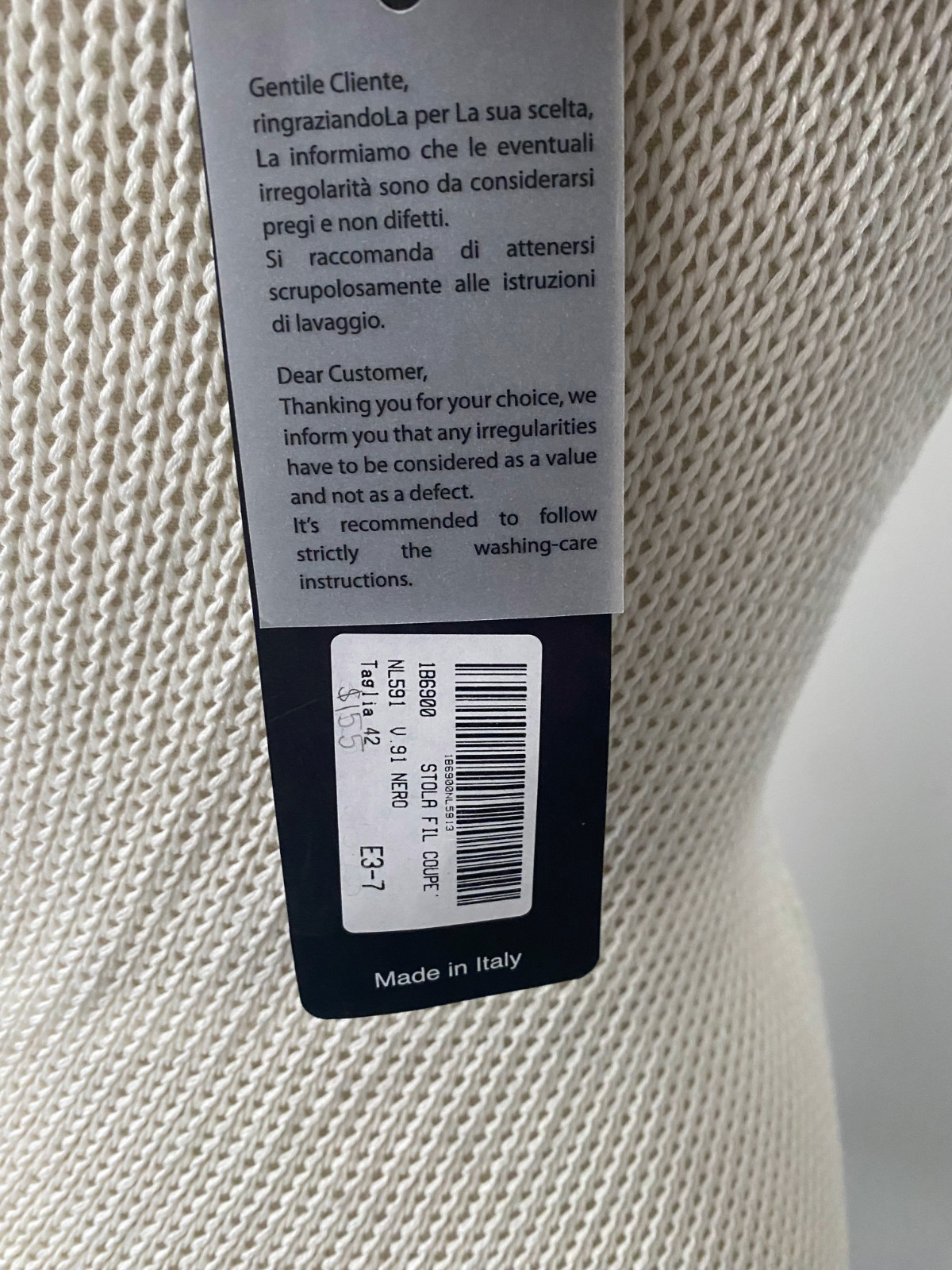 Pier Antonio Gaspari Ecru knit sweater, Made in Italy, with an asymmetric cut