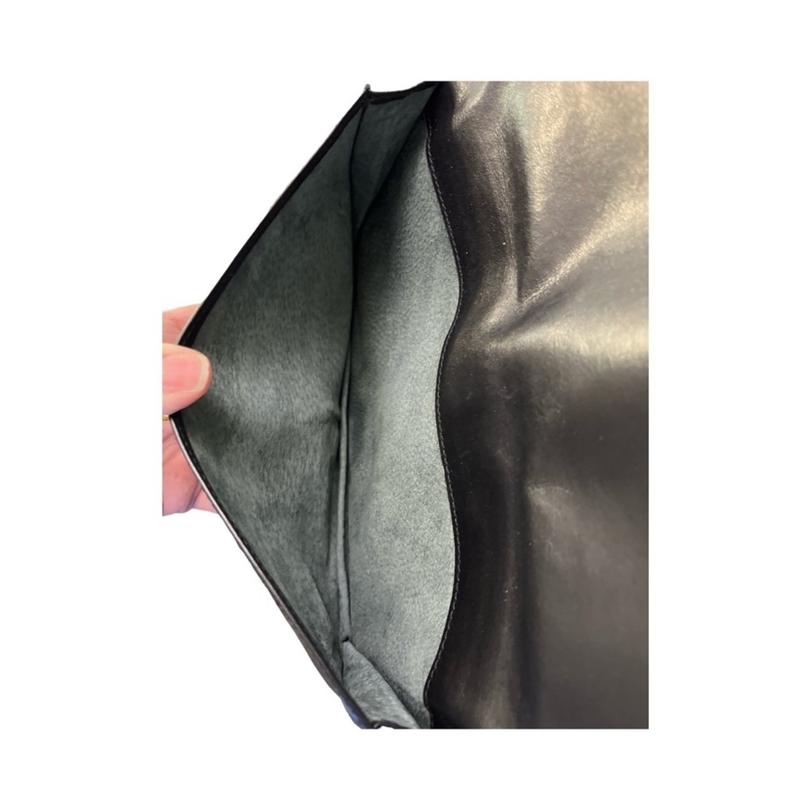 Loewe Anagram Clutch Black Leather Sleek Minimalist Spanish Designer Luxury