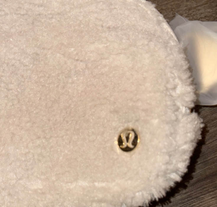 lululemon everywhere crossbody bag 2l. Furr bag great for fall or winter.