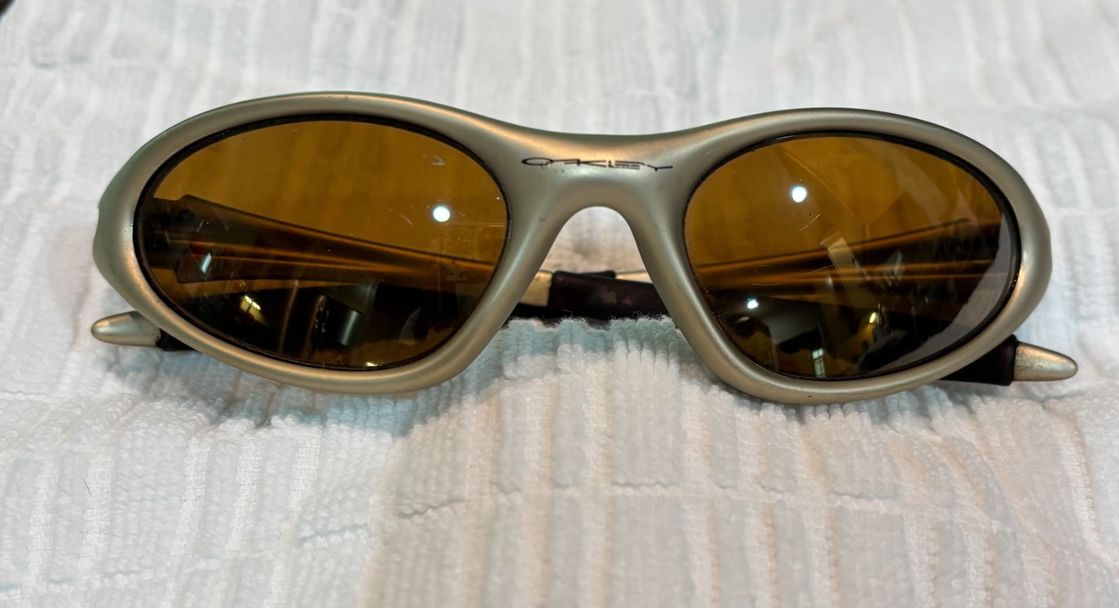 Oakley Minute 1.0 Sunglasses; Gold Frame with Amber Lenses