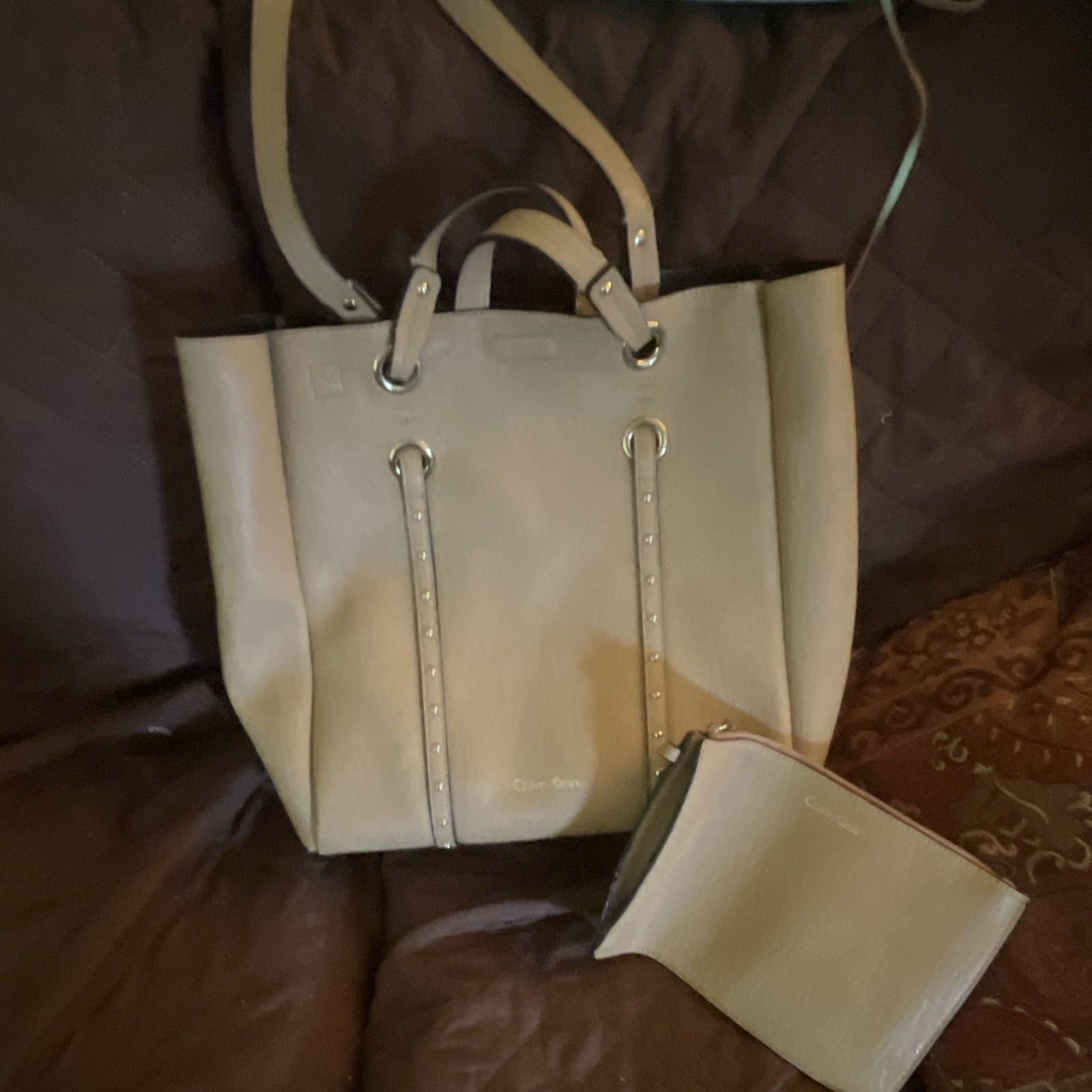 Calvin Klein Large Beige Pebbled Tote Bag Studded Grommet Accents pockets.