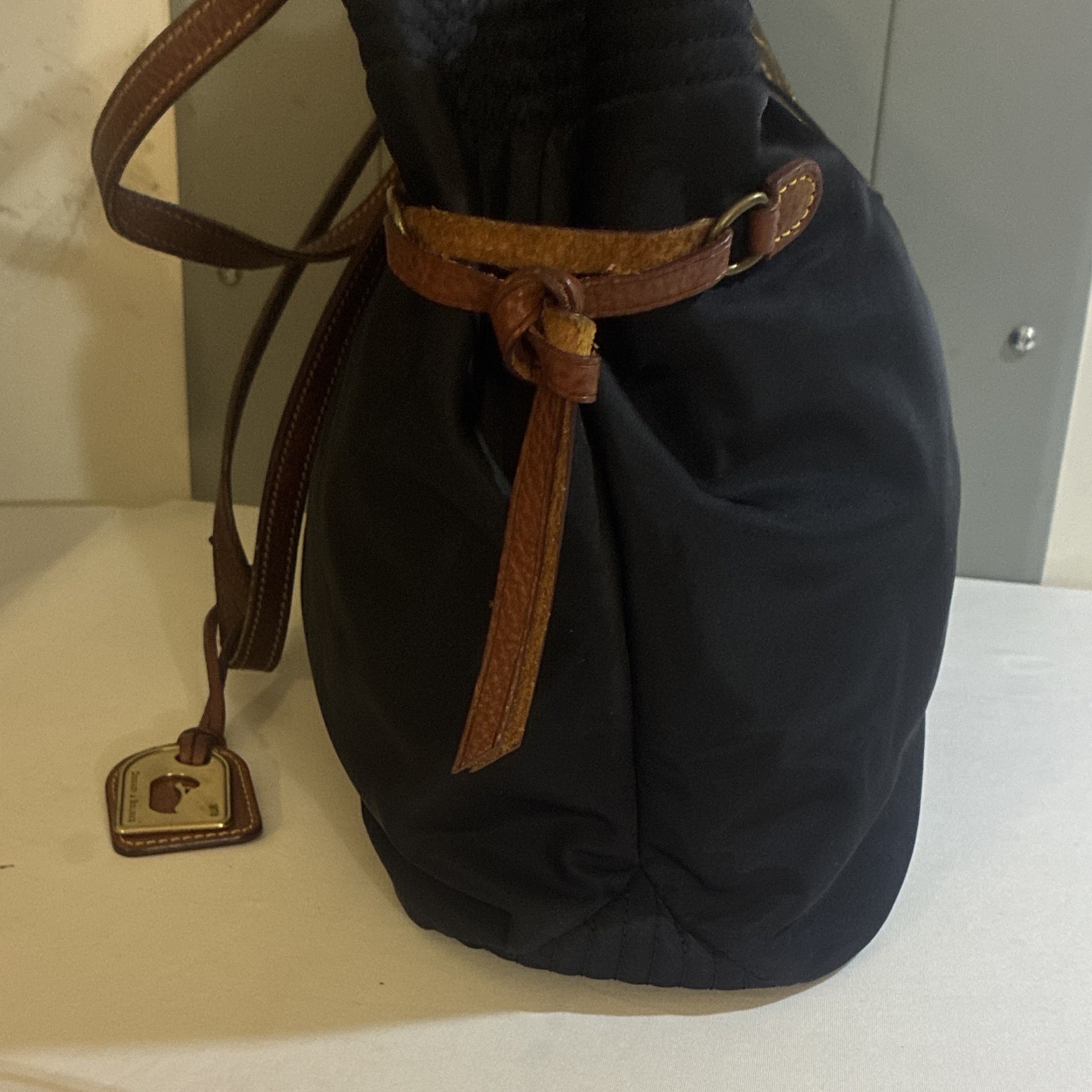 Dooney & Bourke Black Tote Bag, Zip & Magnetic Closure, Gold Hardware, Charm
