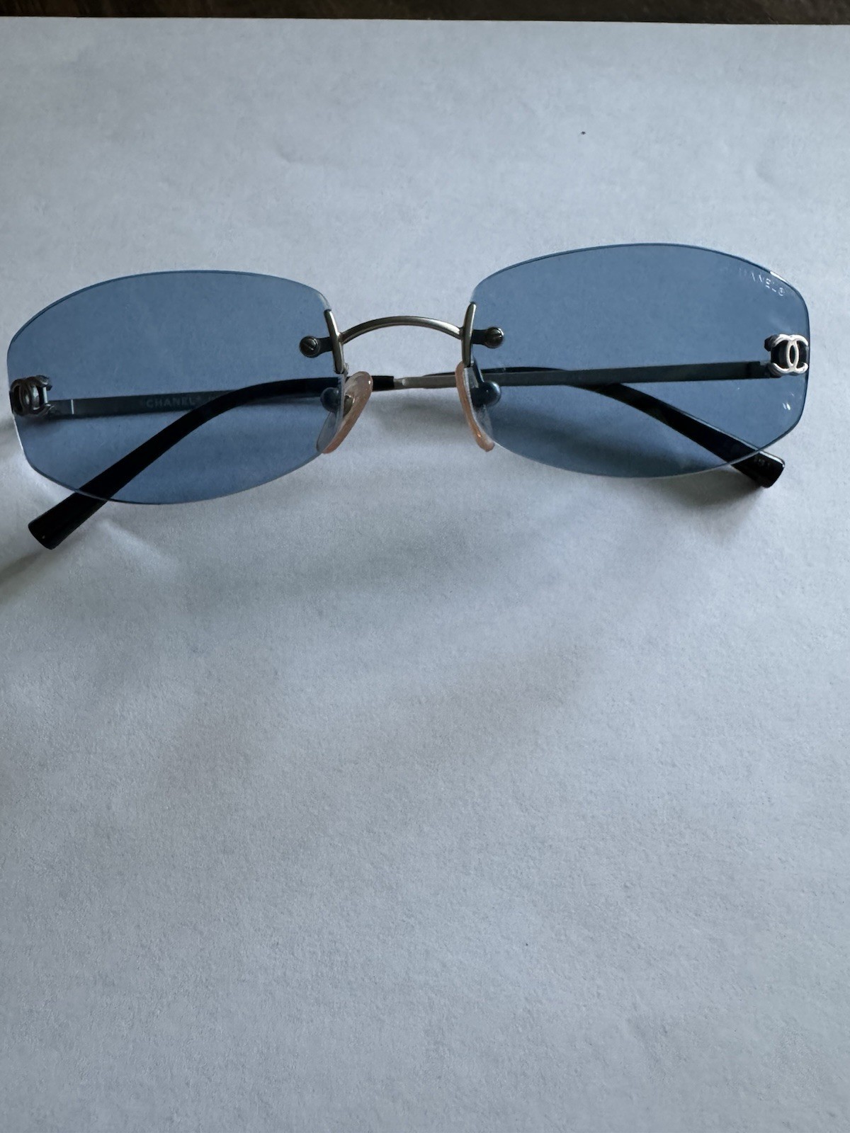 Vintage CHANEL 4002 Rimless Sunglasses Tinted Blue Lenses Silver Metal Frame