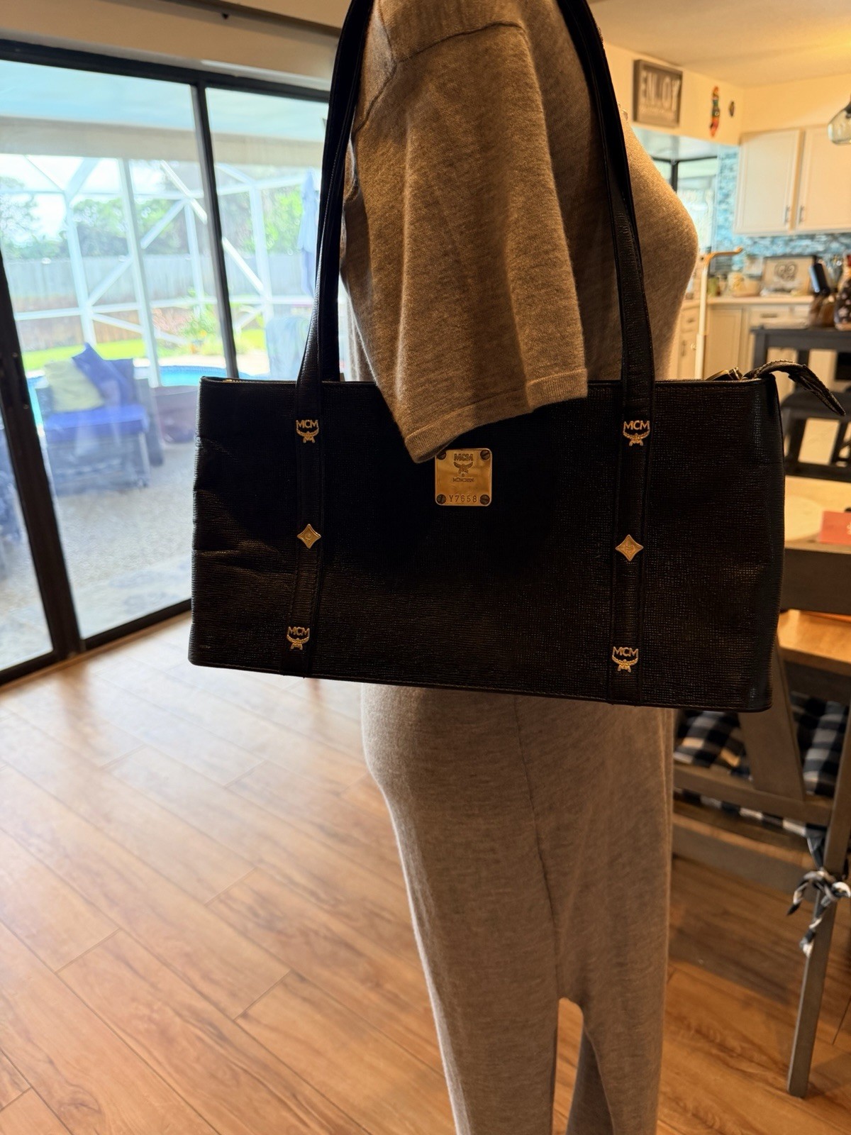 BEAUTIFUL!MCM Canvas Black ToteBag with Gold Plaque and hardware!