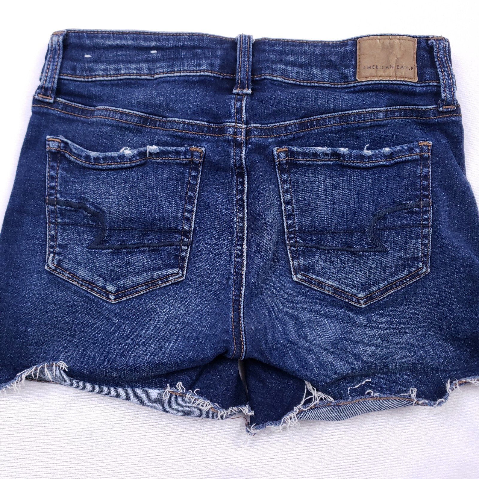 American Eagle Shortie Denim Shorts 26 in Blue Frayed Hem Coastal Cowgirl Chic