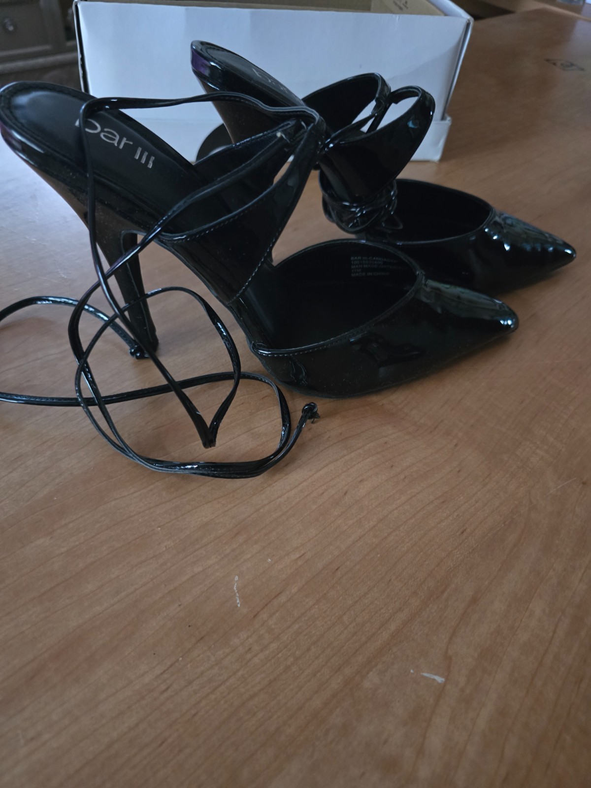 stiletto heels size 11 black patent leather. Wrapped string around ankles