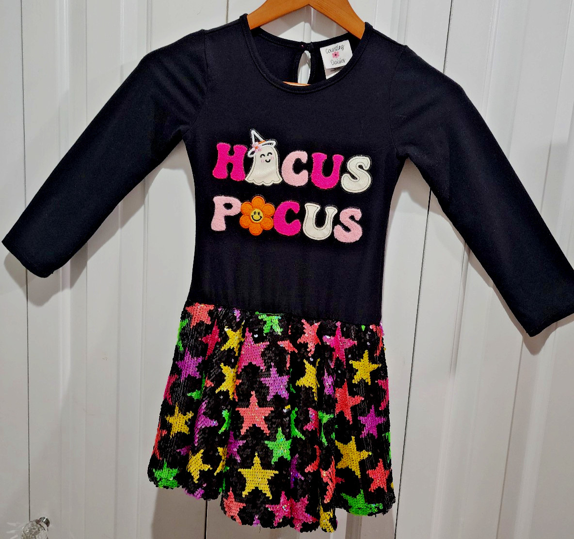 Counting Daisies girls 7 – 8 Black Hocus Pocus dress. Colorful sequins