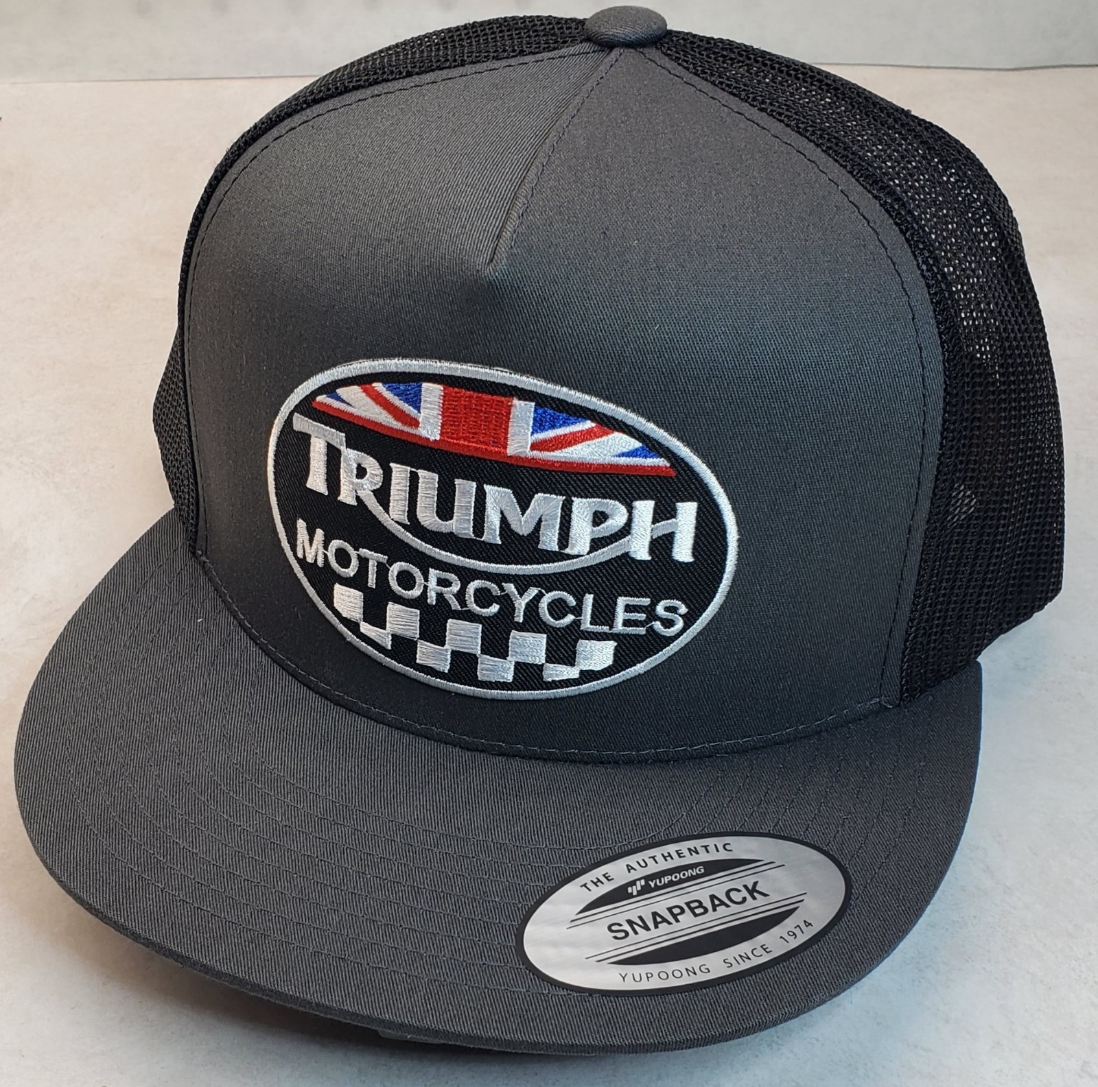 Triumph Motorcycles Embroidered Patch Trucker Hat/YP Classics 6006 Charc/Black