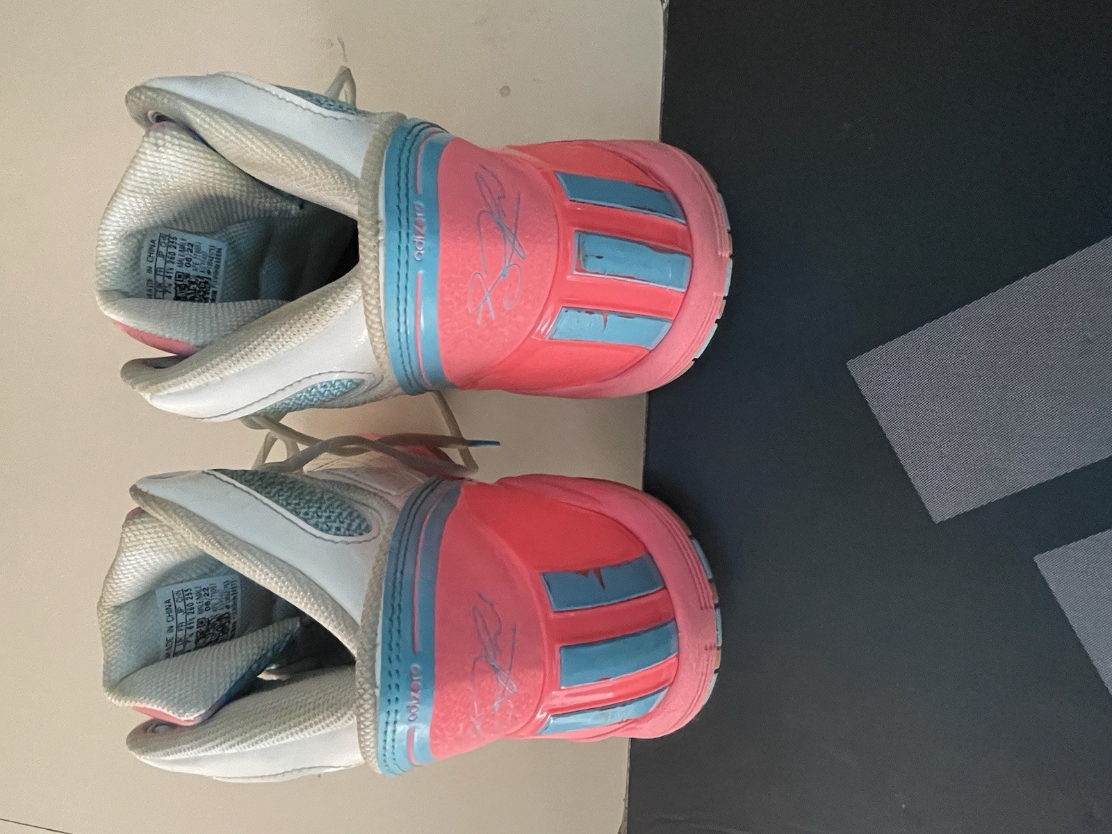The Basketball Adidas Shoes With A Pink Color