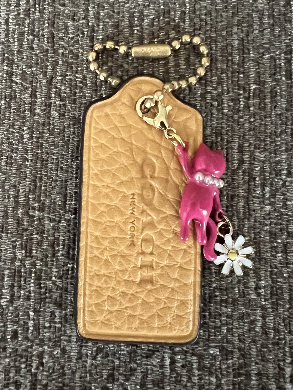 Genuine Coach 2.25” Marigold Leather Hangtag with Pink Kitty Cat Daisy Charm New