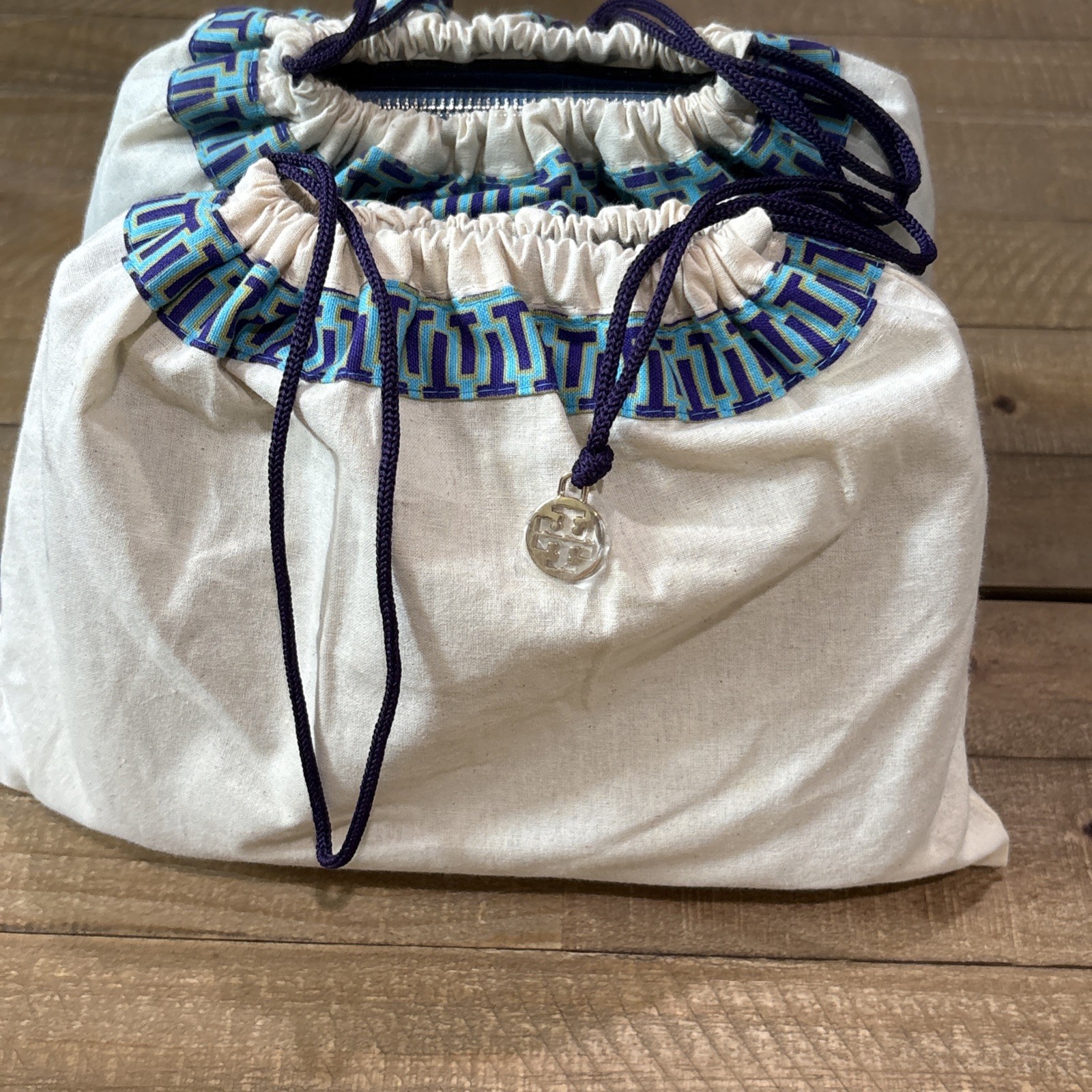 Tory Burch Light Blue Pebbled Leather Crossbody Tassel Logo