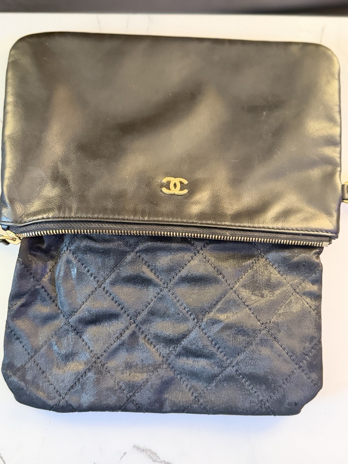 CHANEL Black Quilted Zip Clutch Wrist Strap Chain Tassel Gold CC Logo