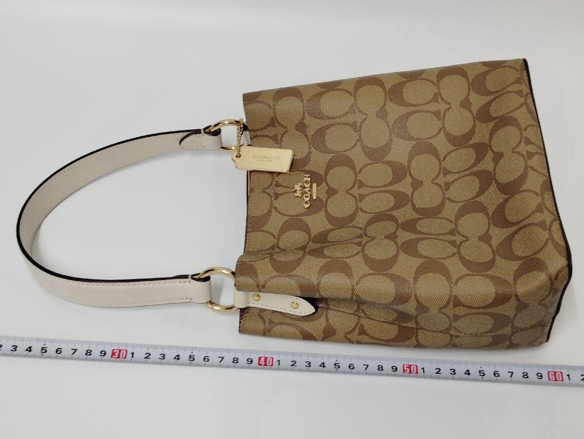 Coach Authentic Signature Small Town Bucket Bag Elevate your everyday style