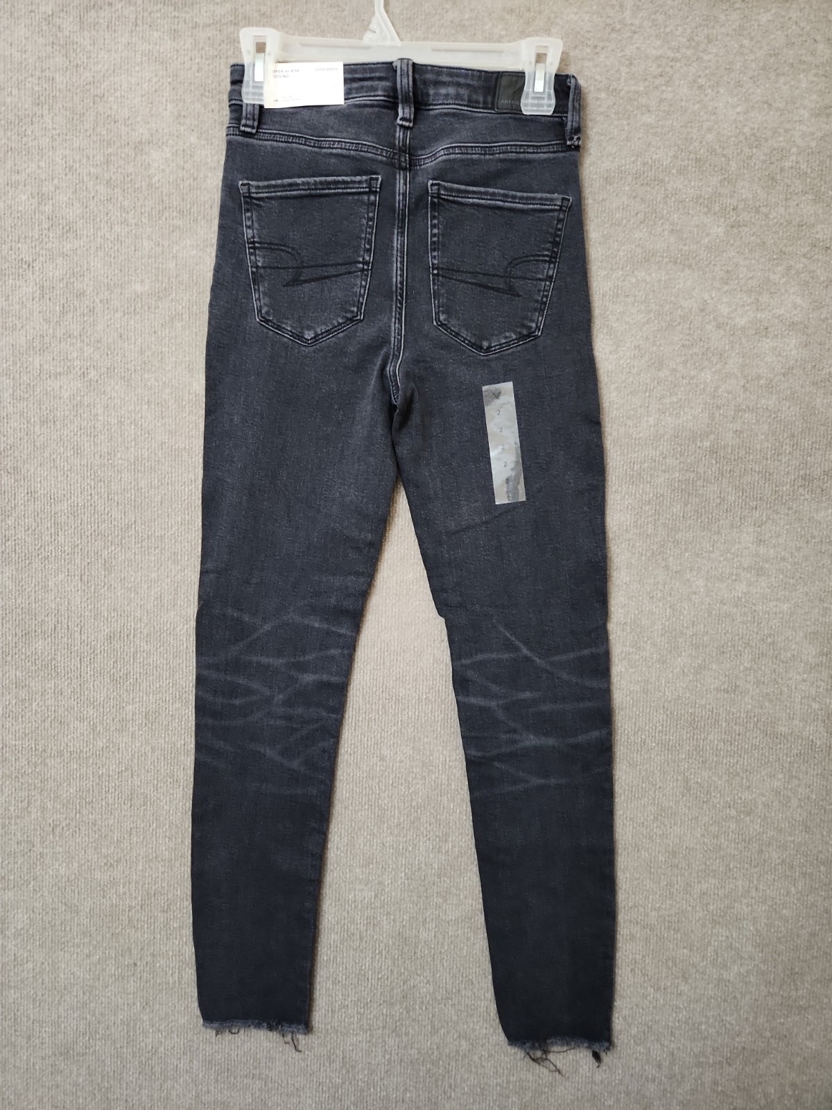 American Eagle Super Stretch Jegging Jeans Womens 2 Black Wash Raw Hem NEW