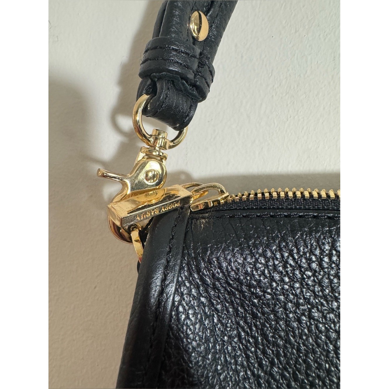 Poppy Barley The classic baguette black leather bag