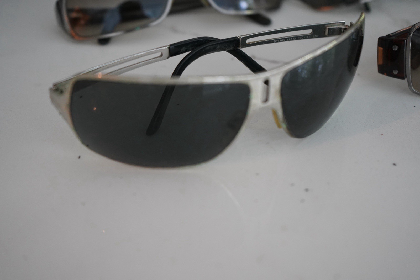 Prada SPR54H (Silver/Black Shield)