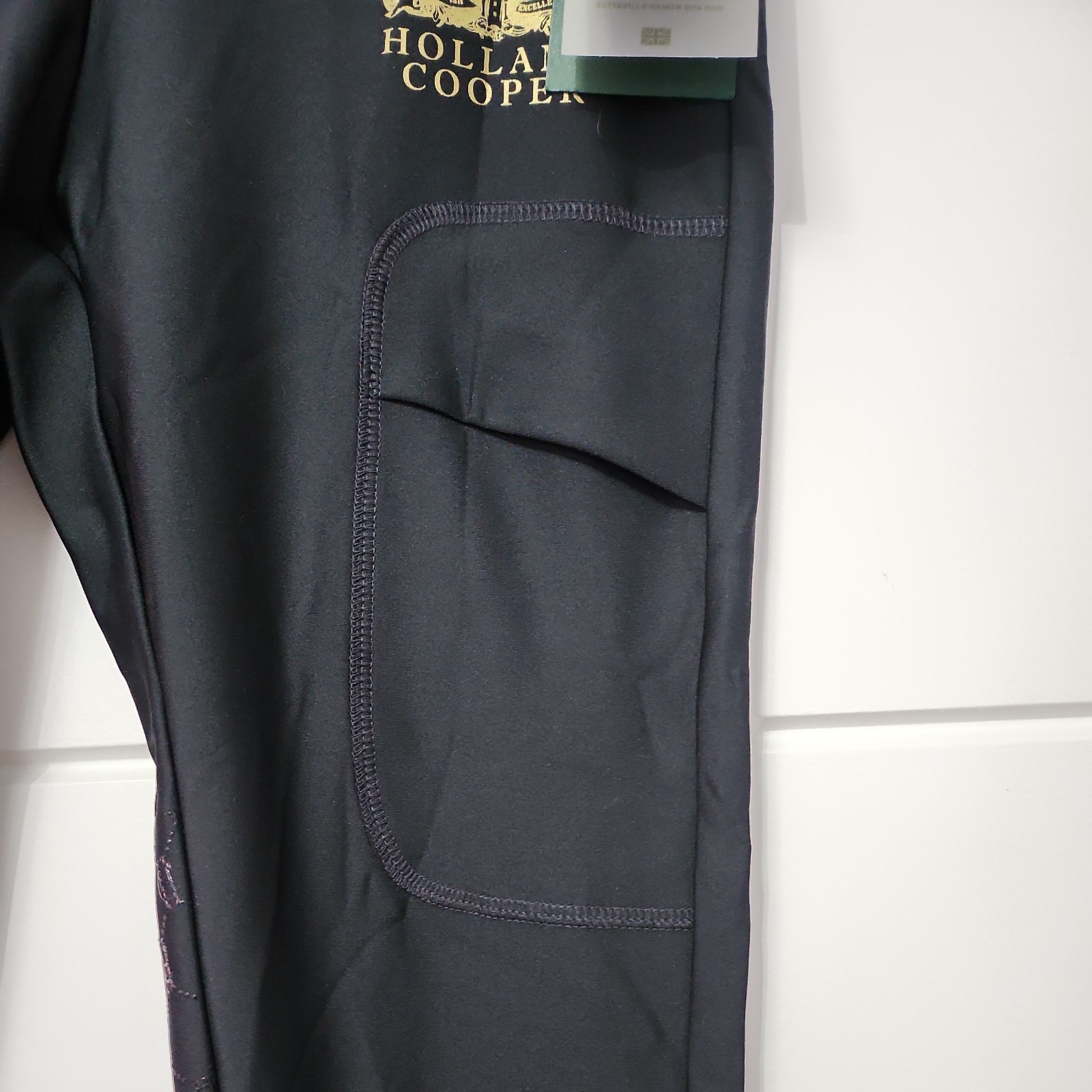 HOLLAND COOPER SPORT LEGGING IN BLACK/GOLD. UK MEDIUM.