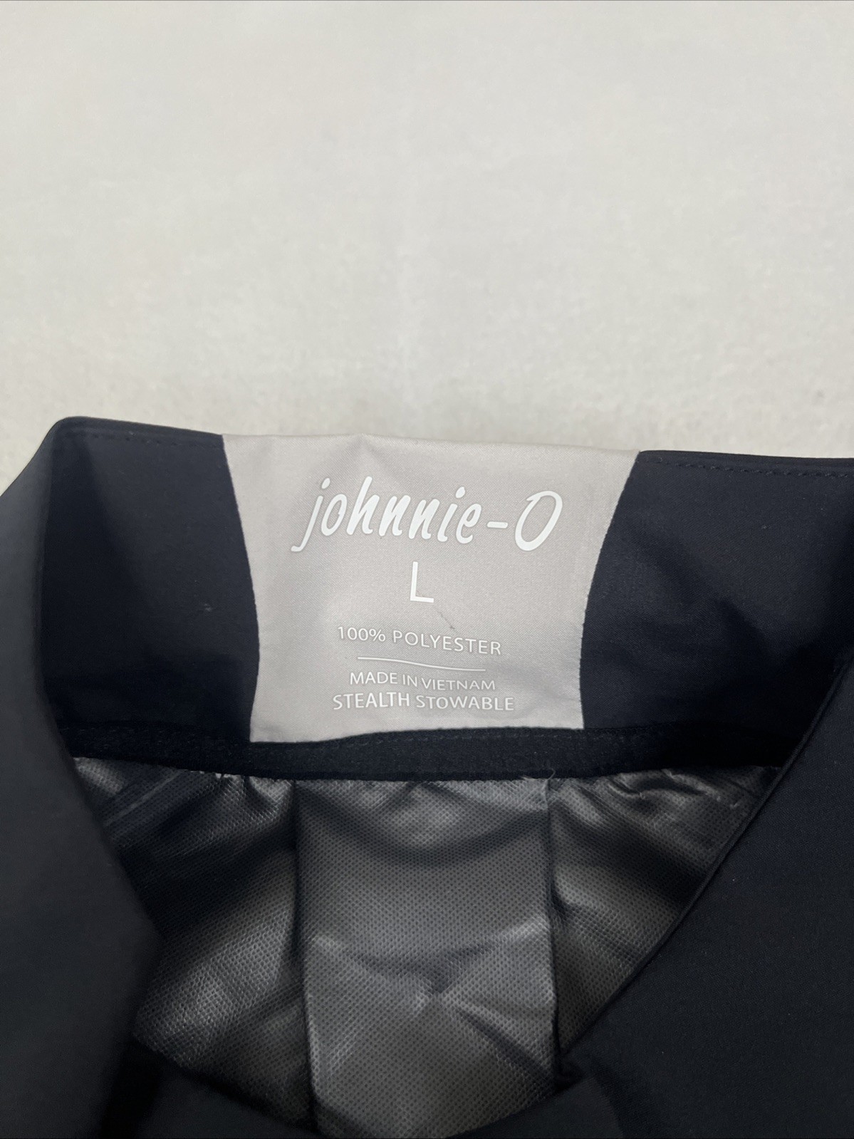 JOHNNIE-O STEALTH STOWABLE SHORT SLEEVE GOLF JACKET SZ L PURDUE BLACK