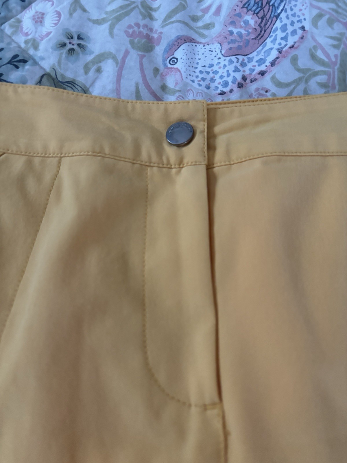 Womens Skorts (4). White, turquoise, tan and yellow. Size 12.