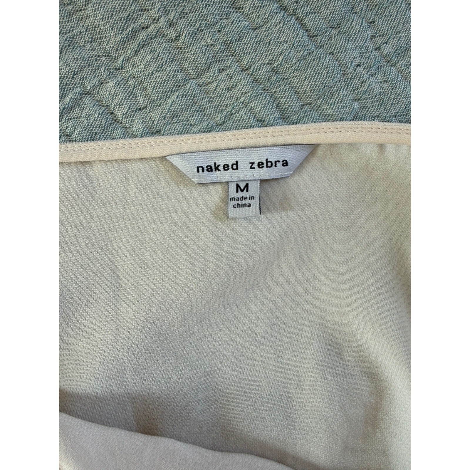 Naked Zebra | Effortless White Surplice Drape Top | Smocked Hem Medium