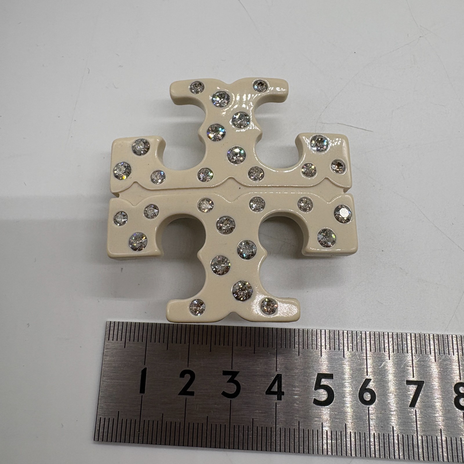 TORY BURCH accessory barrette with rhinestones and logo, white, no. 195