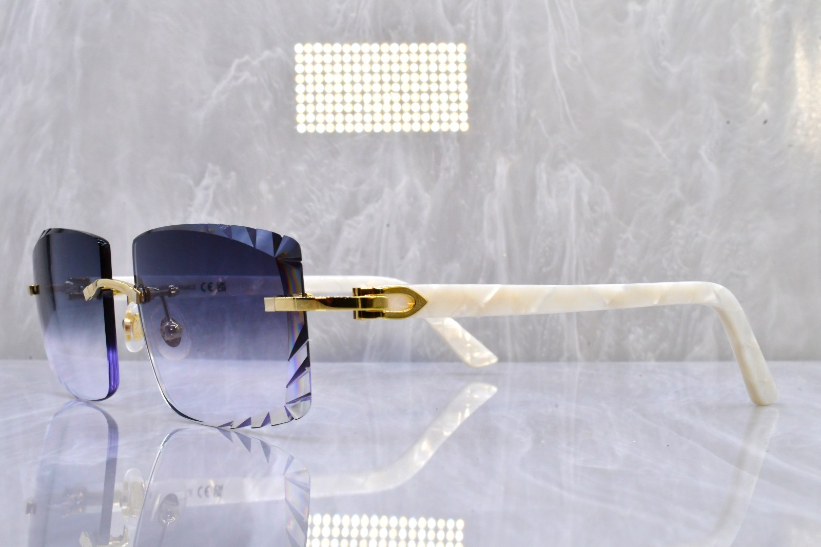 Cartier rimless white c decor gold Diamond cut white pearl sunglasses ct0056o