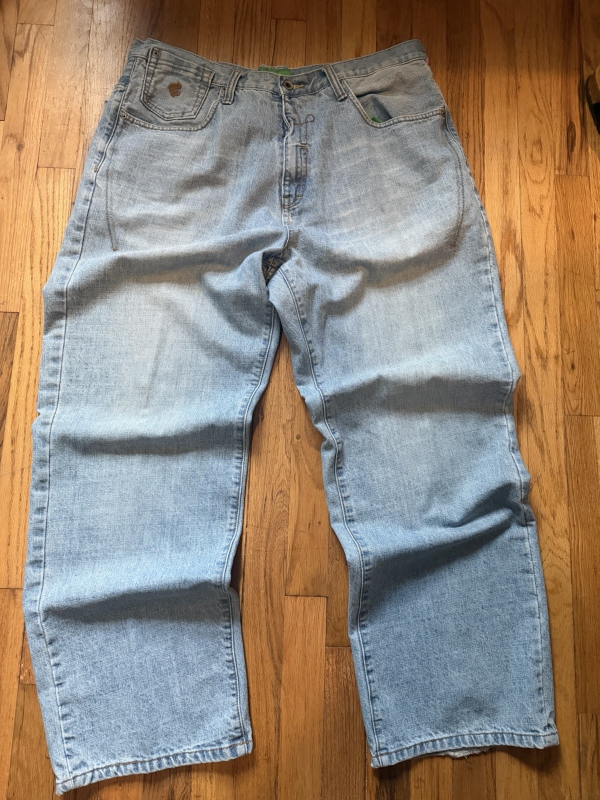 Men’s Light Wash Blue Solid Denim Jeans Logo Accents 5-Pocket Design