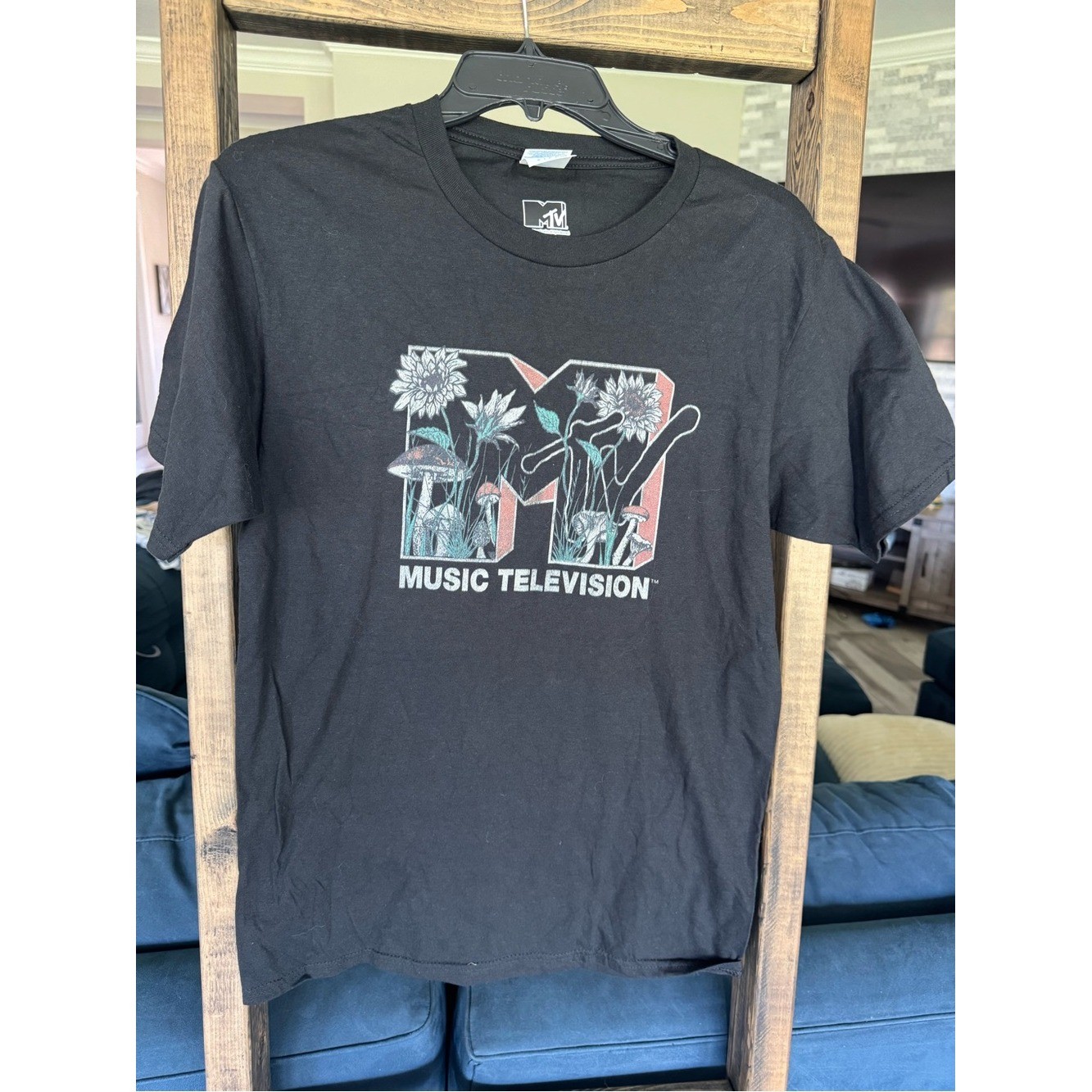 MTV Black Tee with Multicolor Floral Logo
