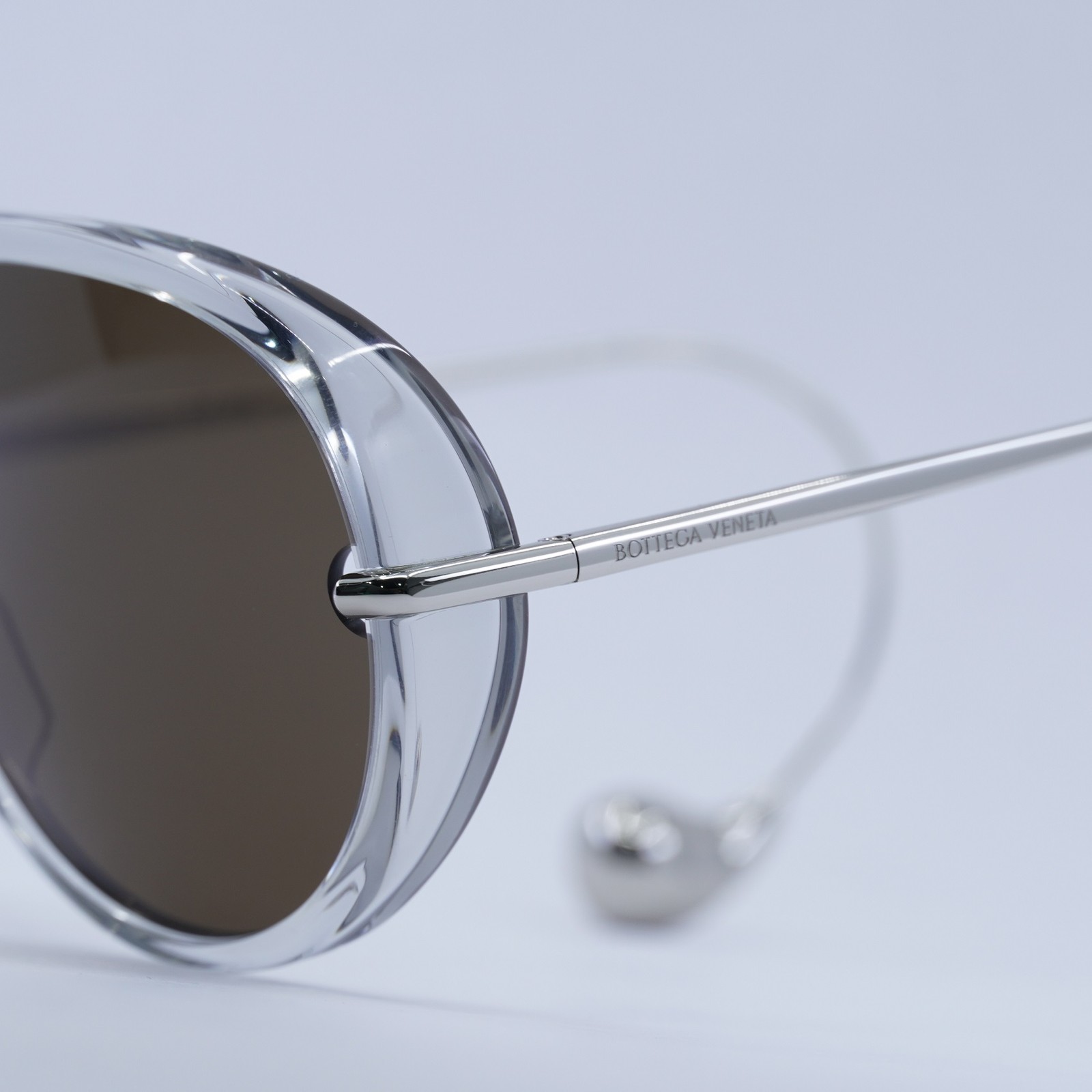 BOTTEGA VENETA BV1273S 009 Transparent Grey/Silver/Brown 63-12-180 Sunglasses…