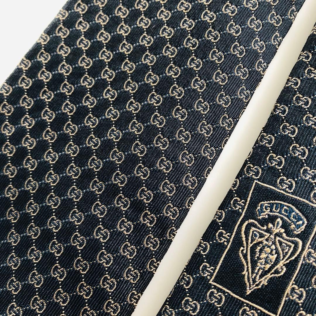 GUCCI Emblem Pattern Silk Tie Black Bronze 8.3cm Wide 154cm Long Pre-owned