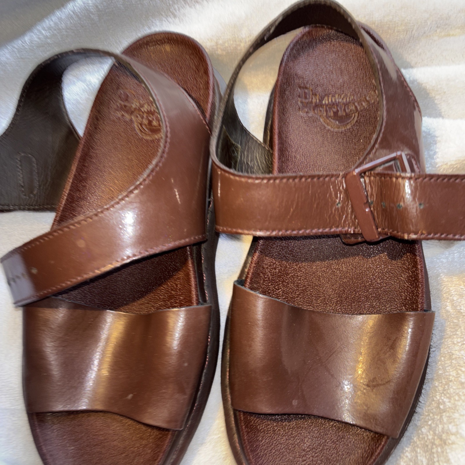Dr. Martens Romi Y-Strap Sandals in an oxblood/brown patent leather finish