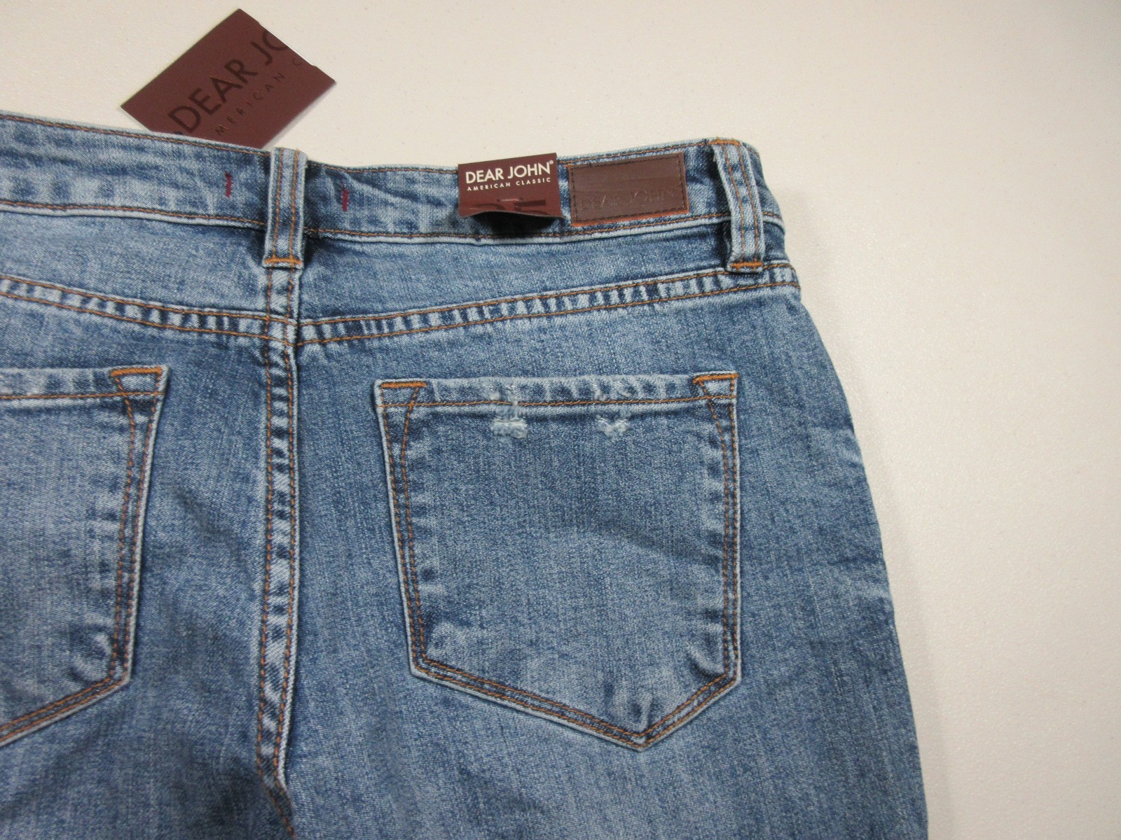 Dear John womens medium wash rips Playback straight stretch jeans 25×32 NWT