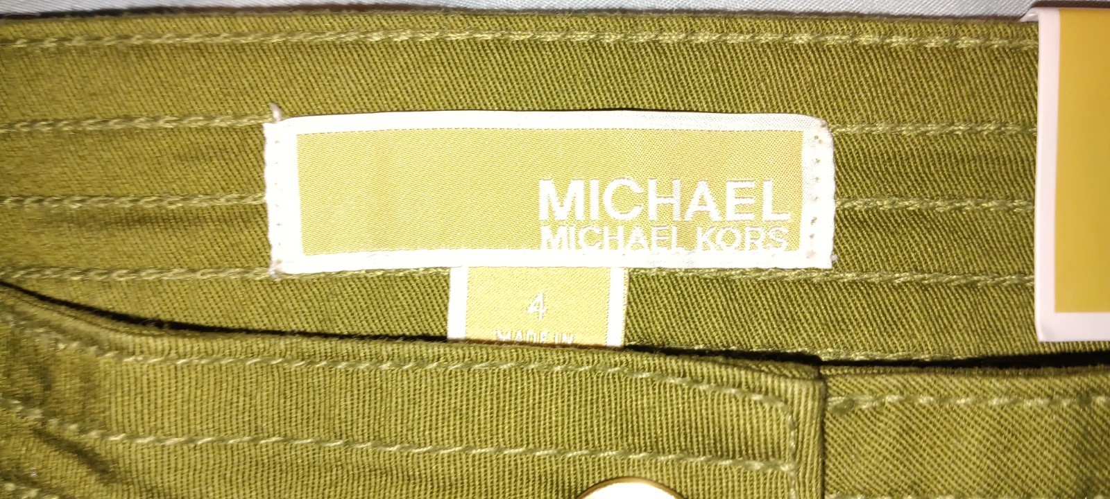 Women’s Michael Kors Brand New w tags. size 4 Capri dressy Olive green w pockets