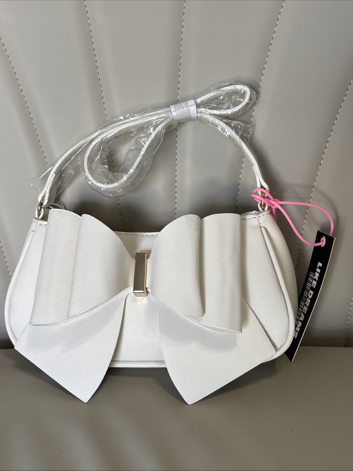 Like Dreams Bowtie Crossbody White Faux Leather Flap Chain Strap Gold Logo
