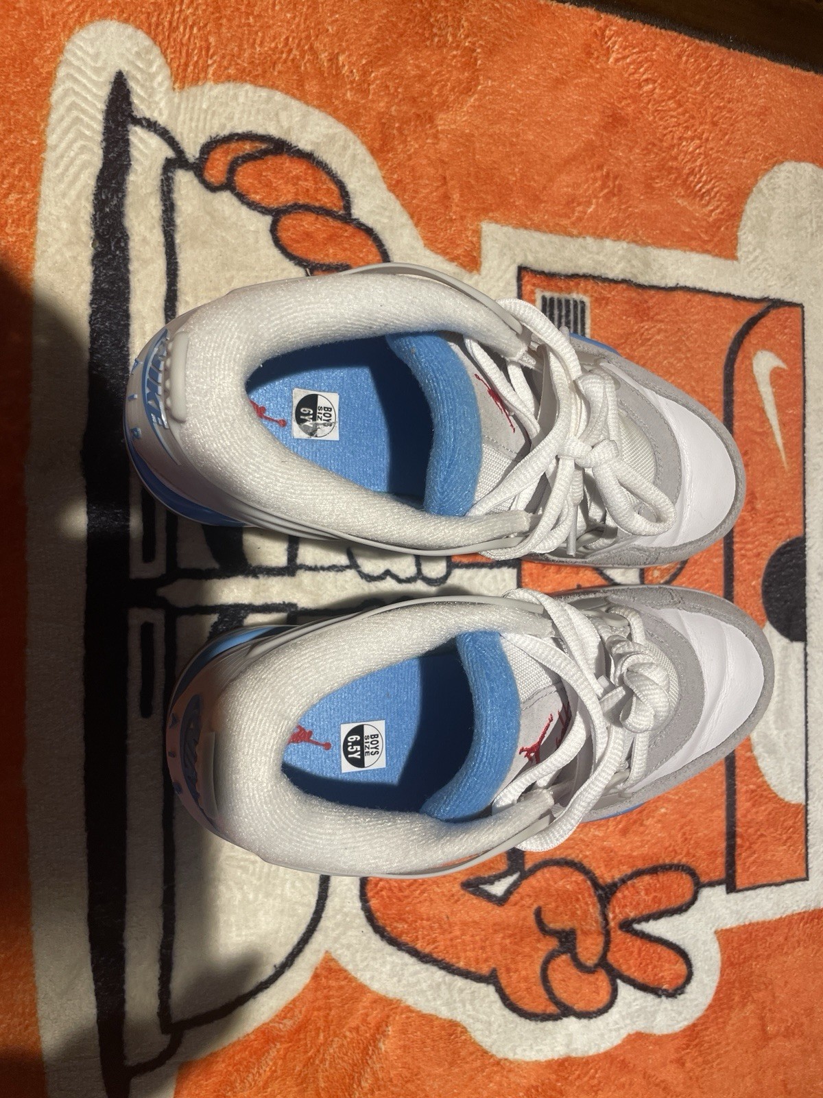 Air Jordan 4 RM (GS) in White / Neutral Grey / University Blue 6.5