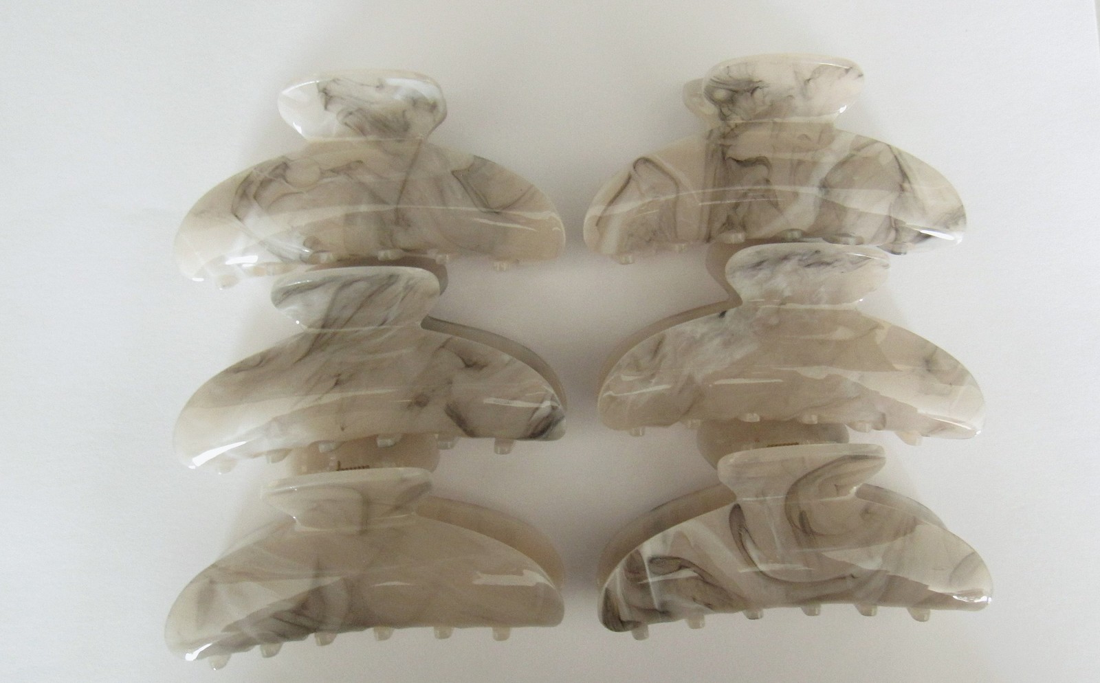One random marbled beige white black gray acrylic hair claw clip