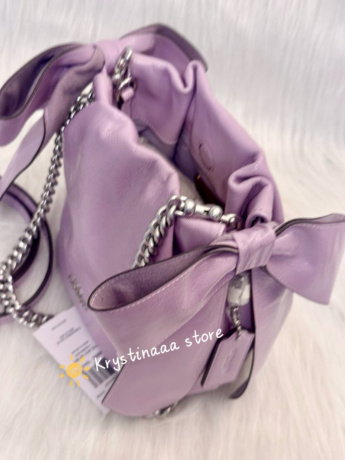 NWT Coach Faye Mini Drawstring Bag With Bows CEL03 in Light Amethyst Leather