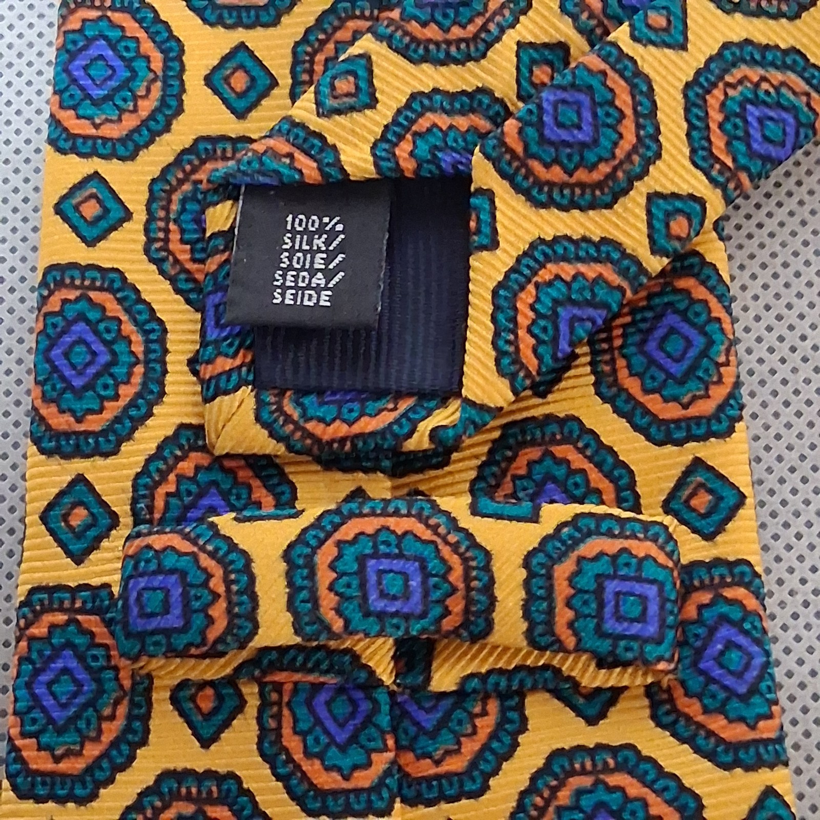Holland & Sherry Silk Necktie Orange Blue Geometric 62″ x 3 1/8″ Made In USA