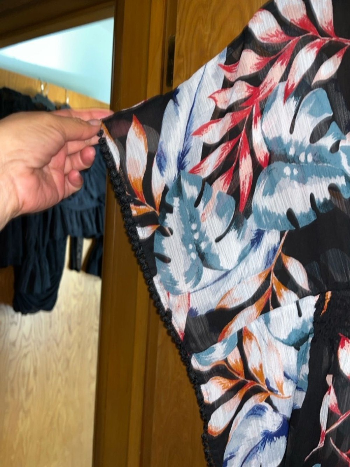 Kona Sol Black Floral V-Neck Tunic with Blue and Coral Leaves
