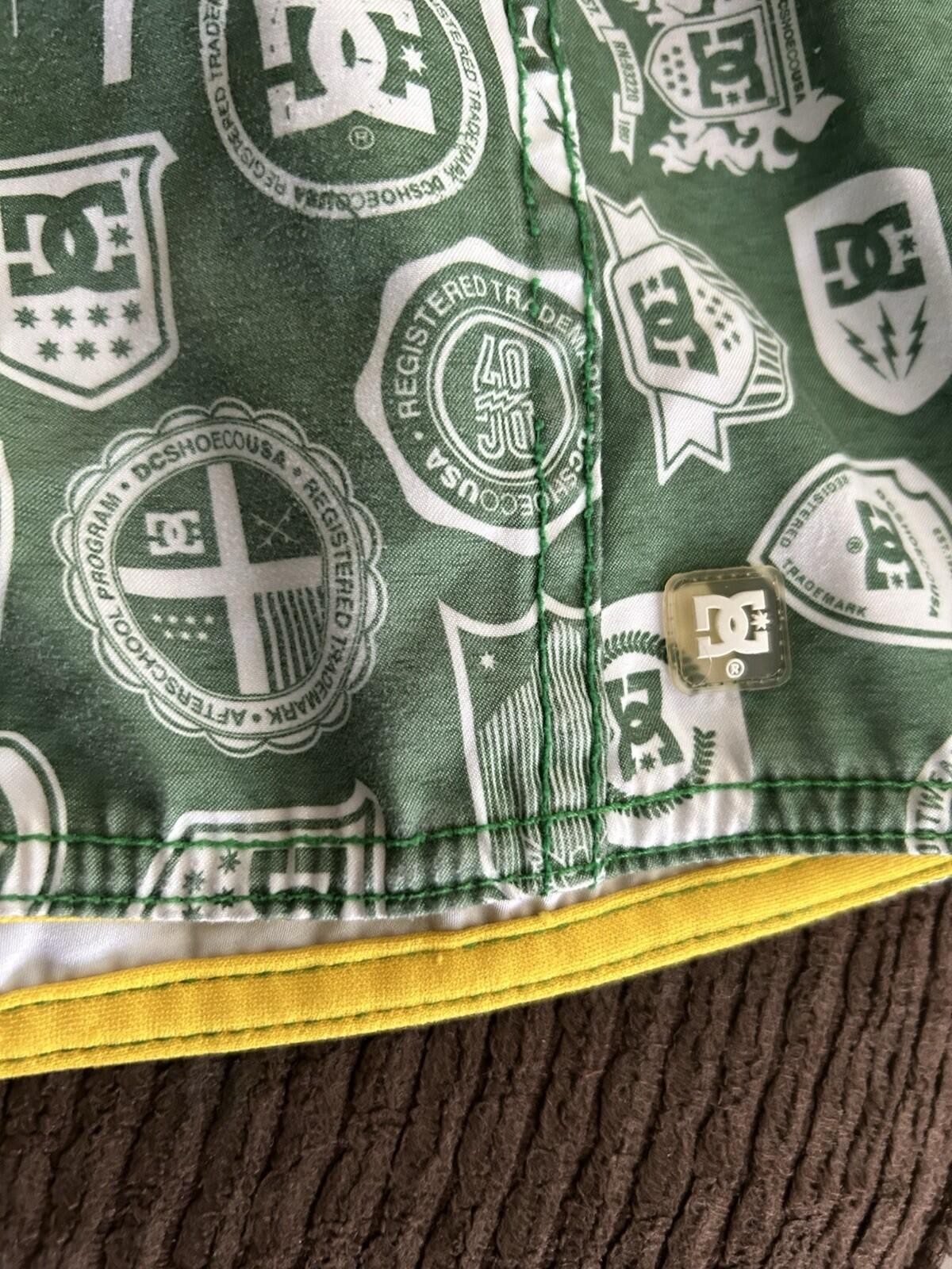 Vintage Y2K DC Shoes Men’s Board Shorts Green Logo Print Size 38 W/ Wax Comb