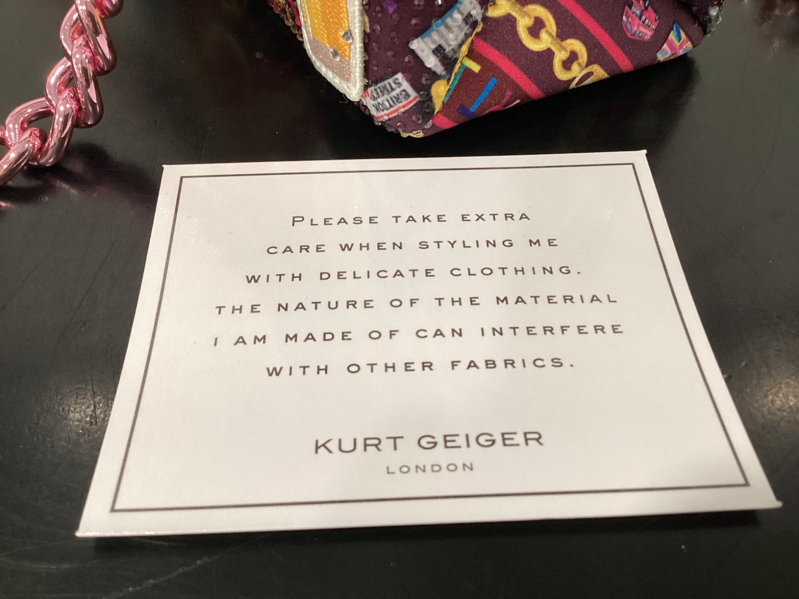 Kurt Geiger London Kensington 10.25″ x 6.5″ x 3.25″ Patches Pink Satin Crystals