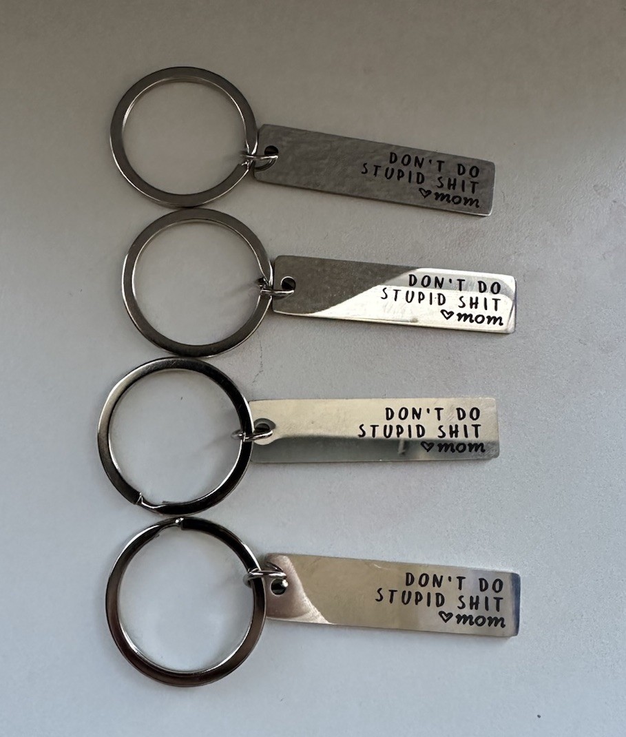 Keychain with ‘Don’t Do Stupid Sh!t Love Mom’ Design.