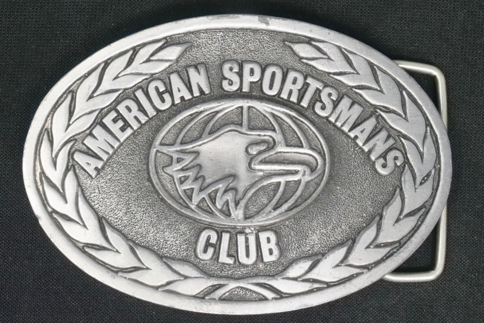 A.J. Dezy Denver American Sportsmans Club Pewter Belt Buckle 3 3/4″ Wide