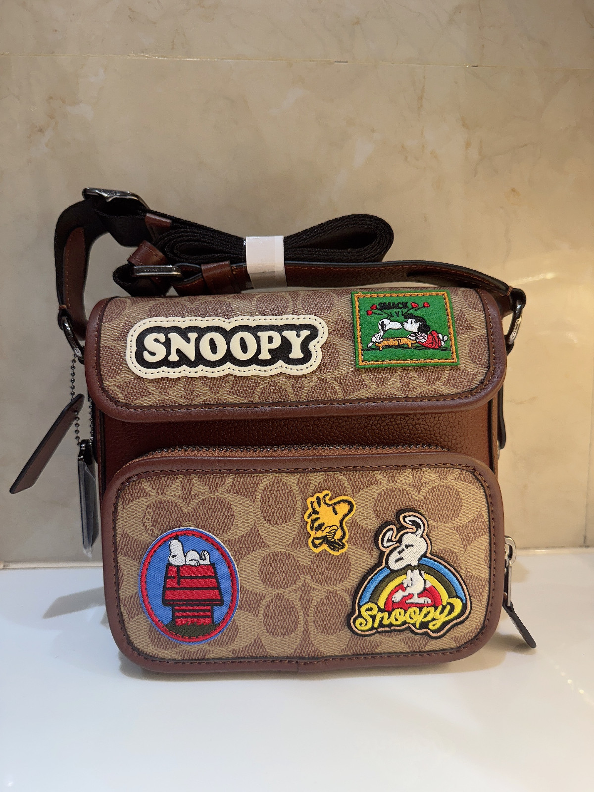 COACH x PEANUTS 2025 Sullivan Flap Crossbody Bag Signature Canvas Patch CBI41
