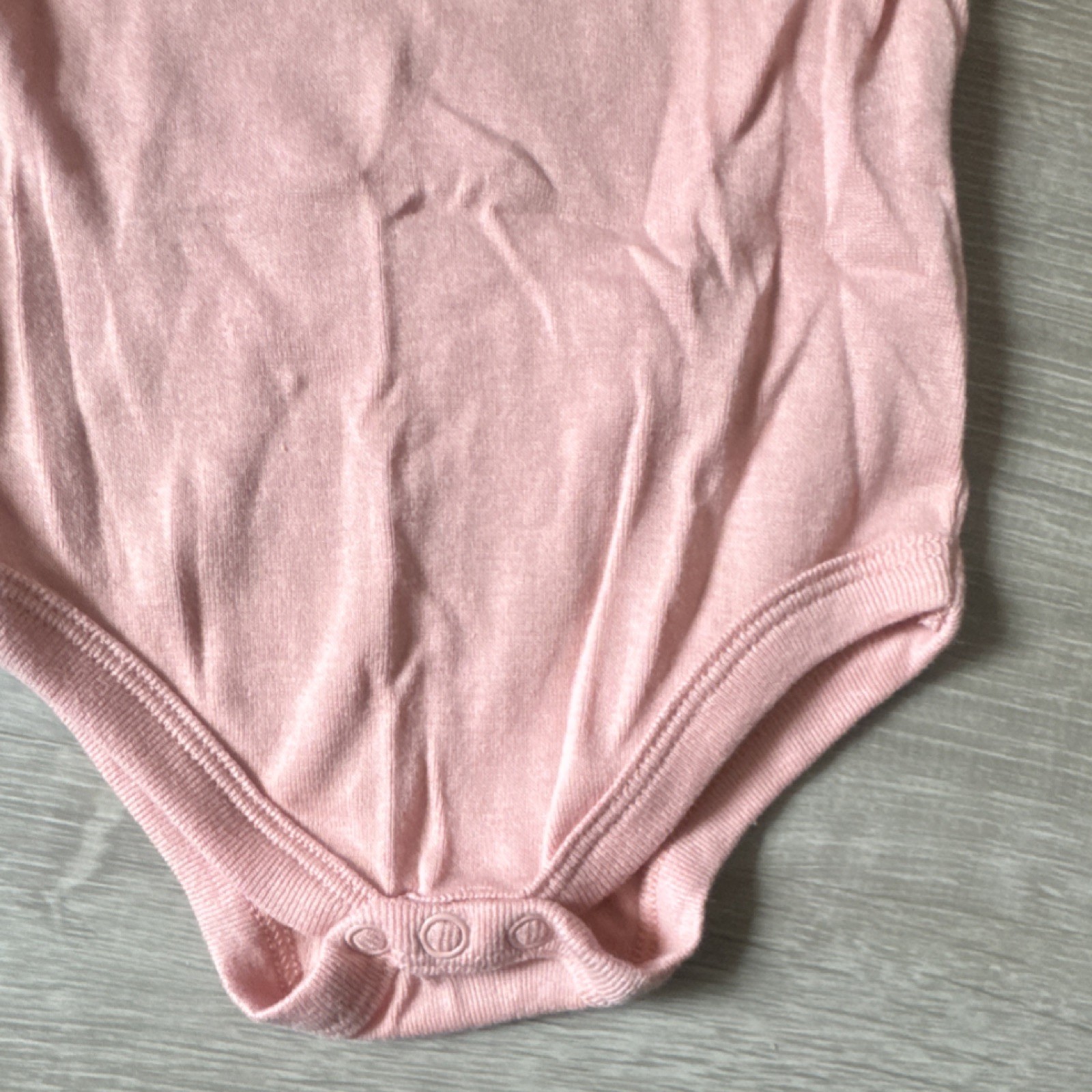 WONDERLUXE Pink Solid Knit Cotton Sleeveless Ruffle Snap One-Piece 0/3M