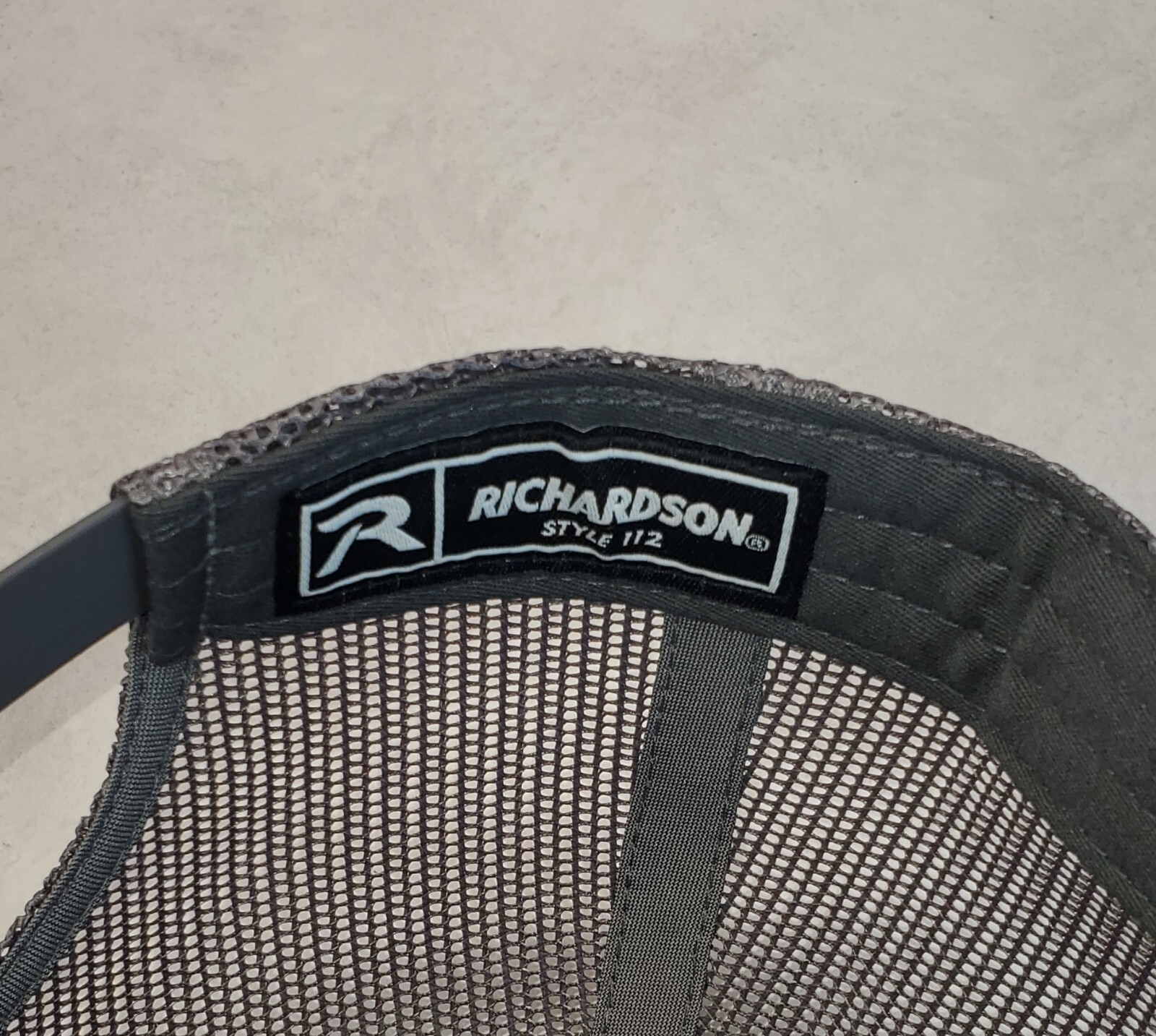 Mossberg Firearms Patch on Richardson 112 Trucker Hat Snapback Black/Charcoal